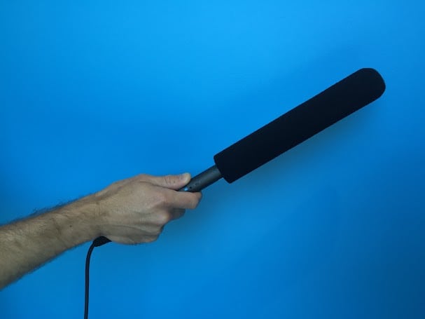Hand-holding a shotgun mic risks recording handling noise — audible creaks and vibrations transferred from the muscles and bones in your hands to the mic.